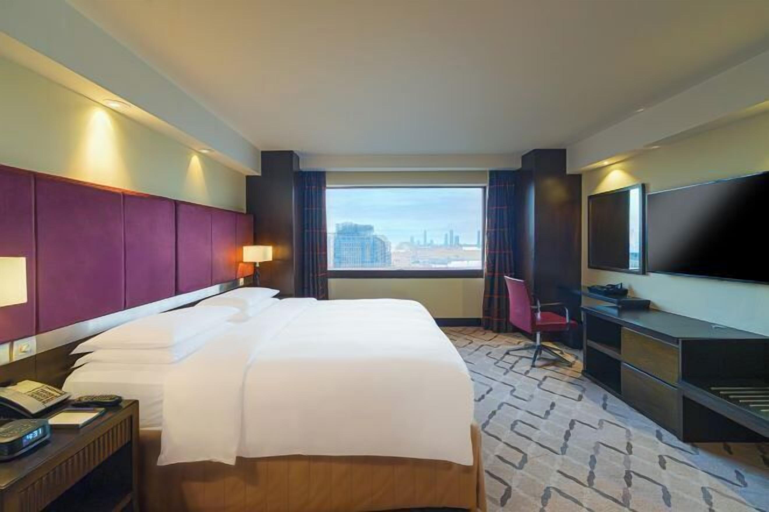 Hypo-allergenic bedding, down comforters, minibar, in-room safe