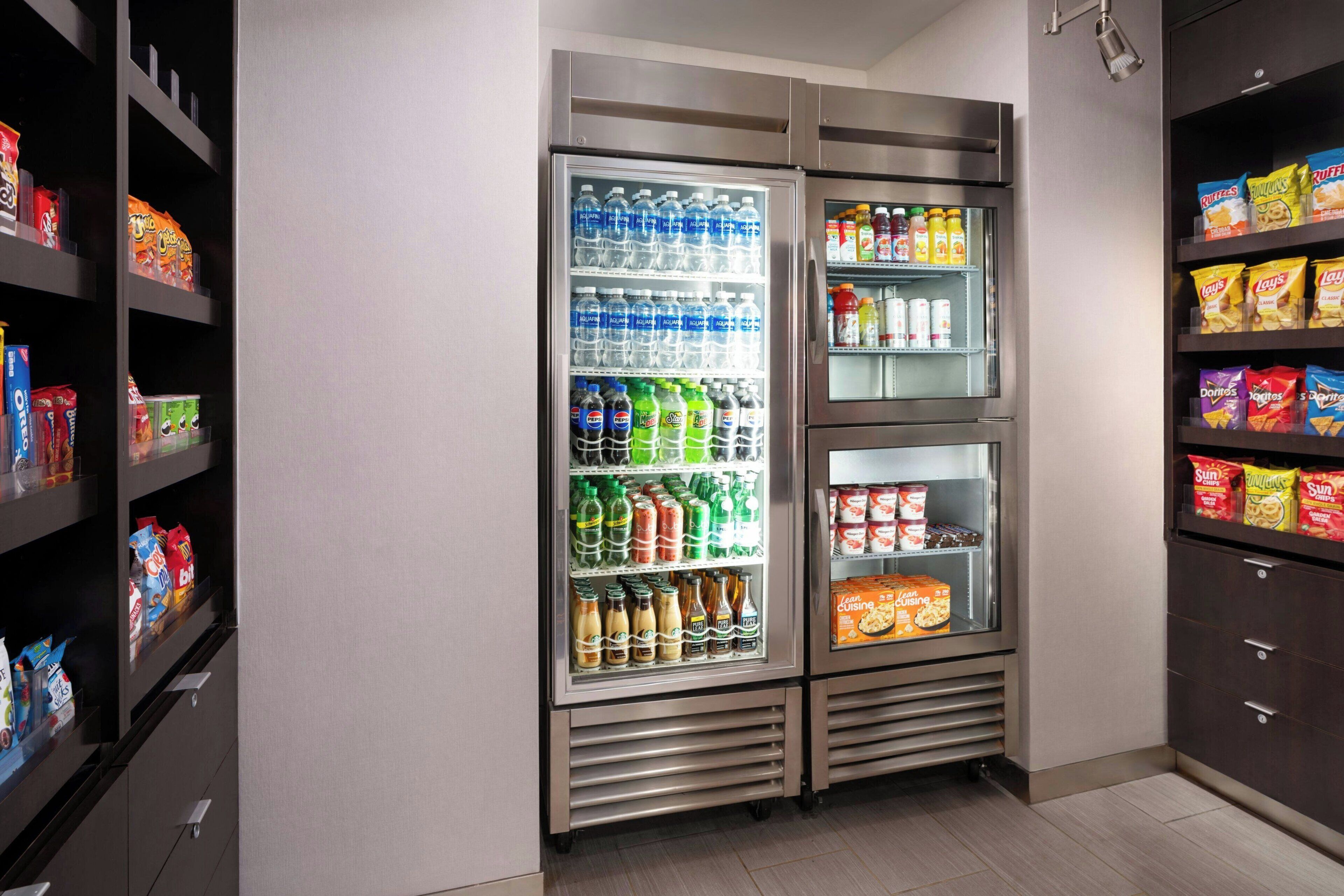 A vending machine with snacks and beverages.