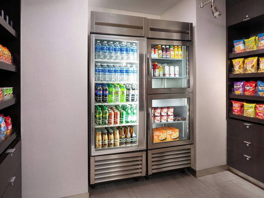 A vending machine with snacks and beverages.