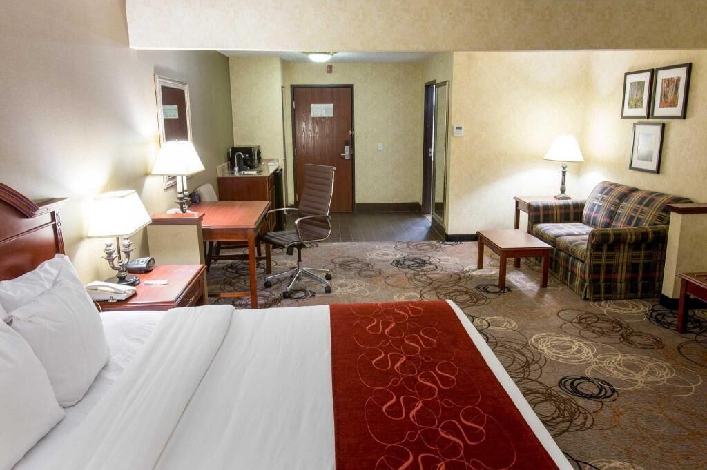 Premium bedding, desk, laptop workspace, blackout curtains