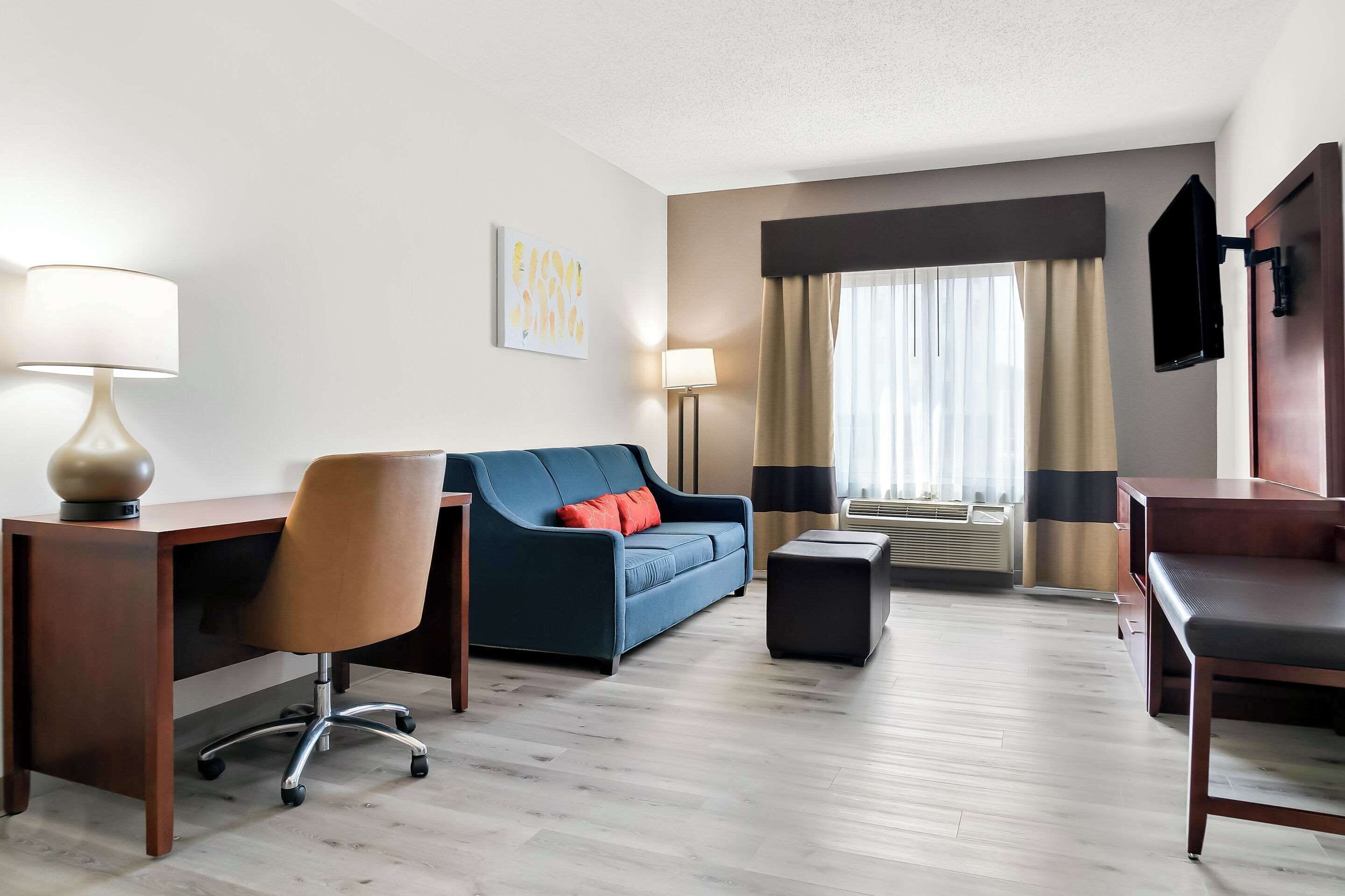 suite, 1 king bed, non smoking | premium bedding, desk, laptop workspace, blackout curtains