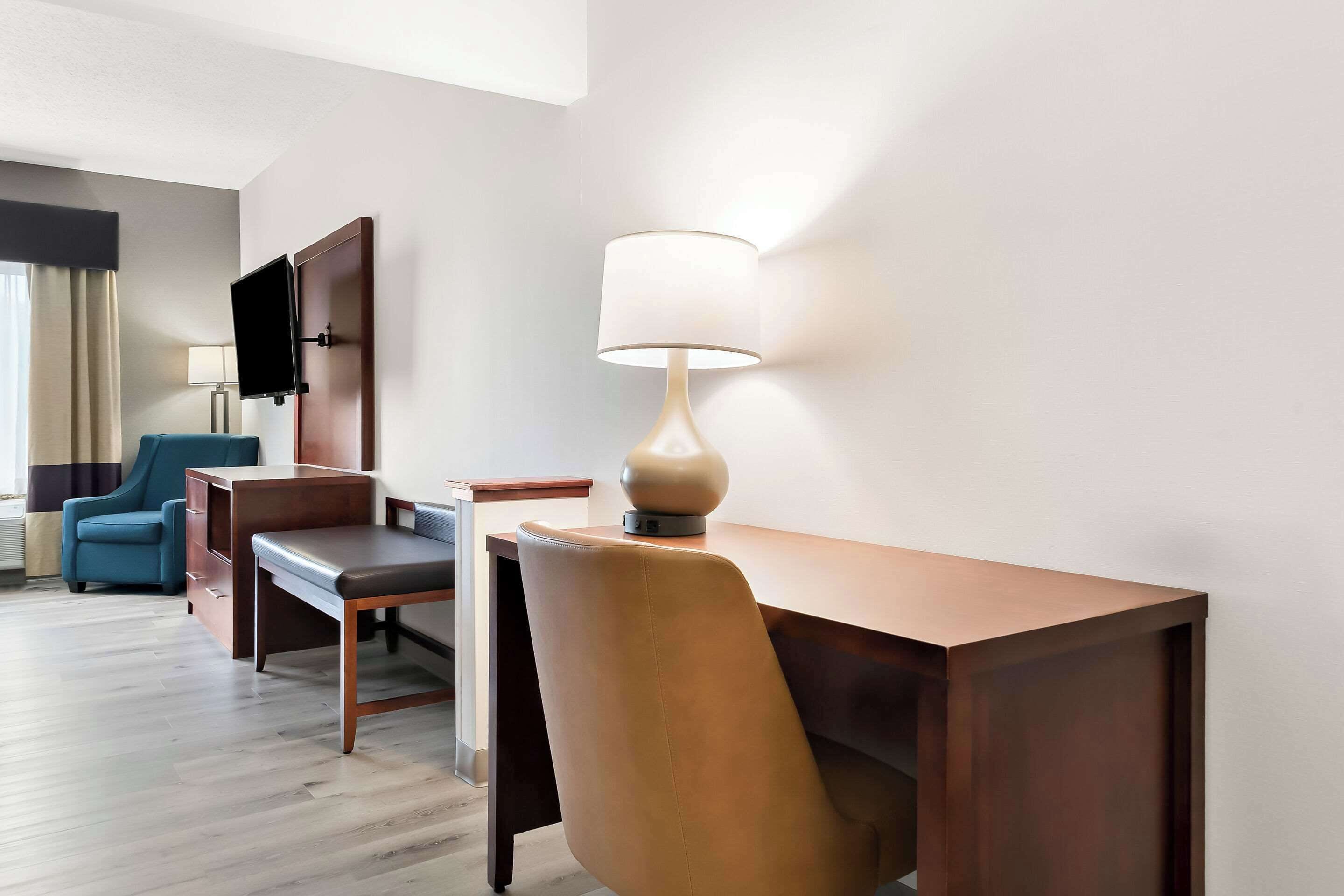 premium bedding, desk, laptop workspace, blackout curtains