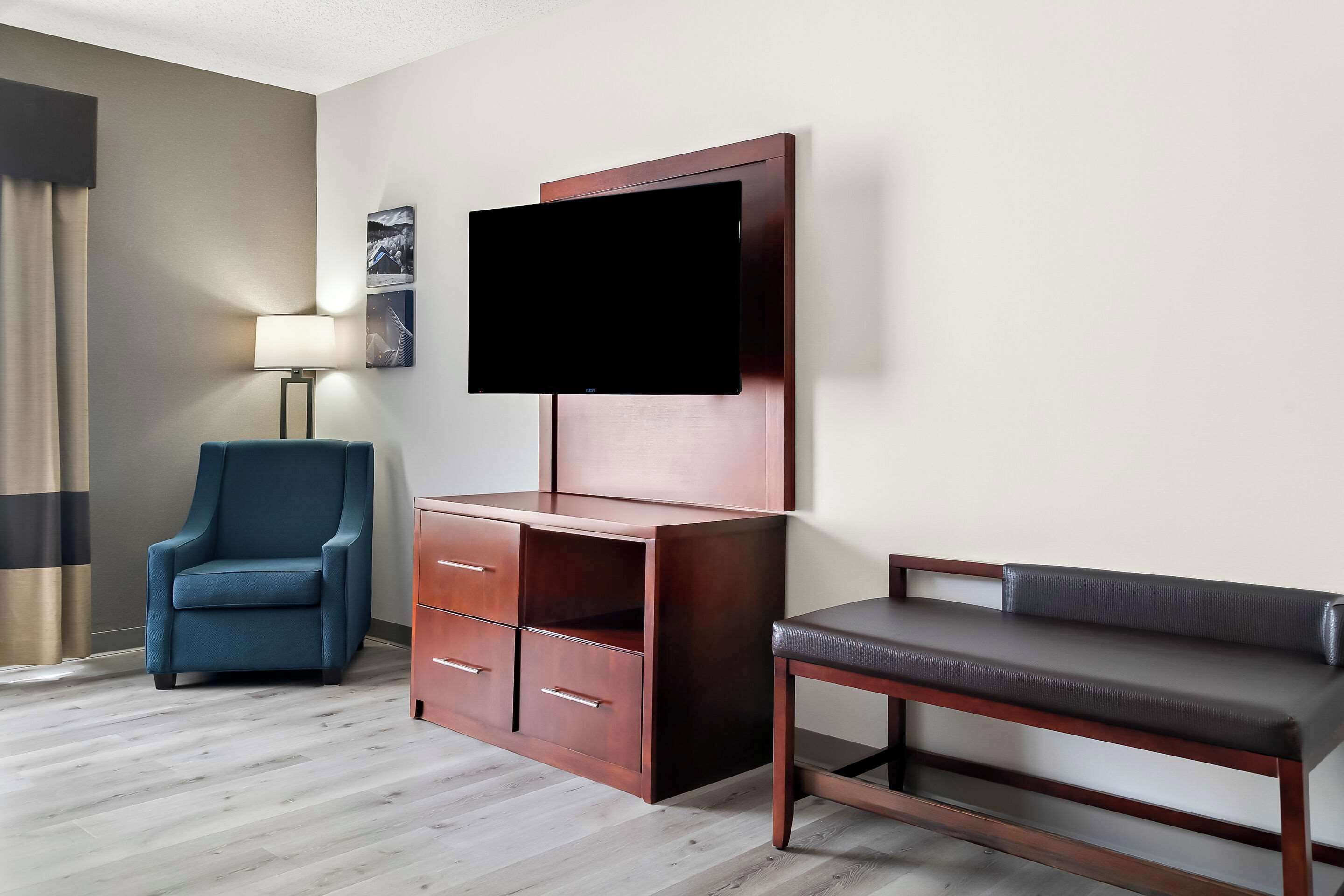 premium bedding, desk, laptop workspace, blackout curtains