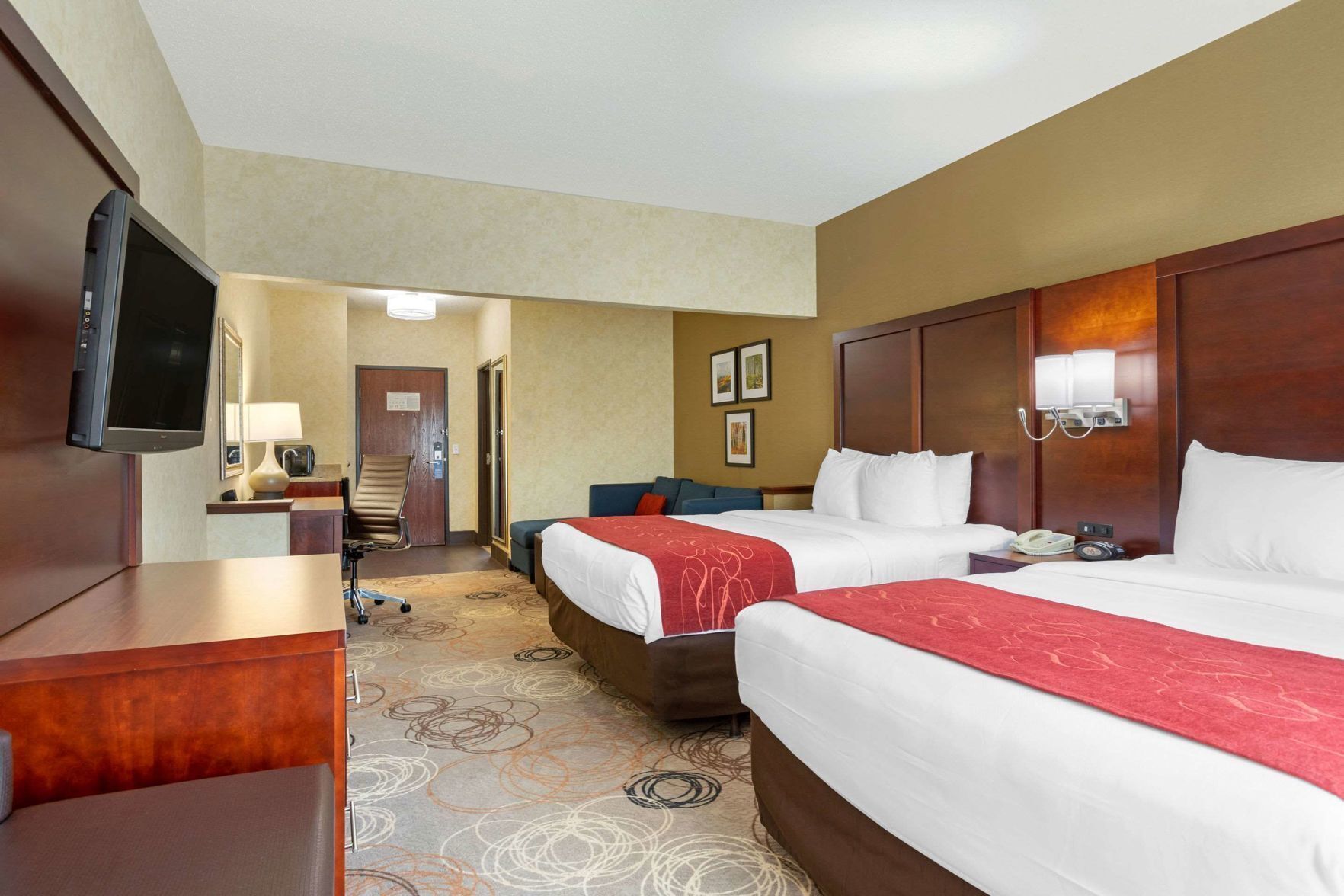 Premium bedding, desk, laptop workspace, blackout curtains