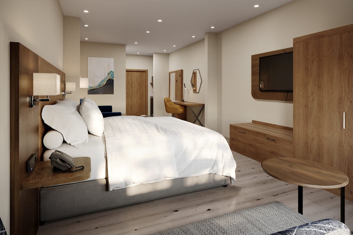 Premium bedding, desk, laptop workspace, blackout curtains