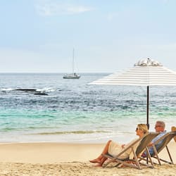On the beach, sun loungers, beach umbrellas, beach towels
