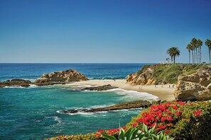 On the beach, sun loungers, beach umbrellas, beach towels