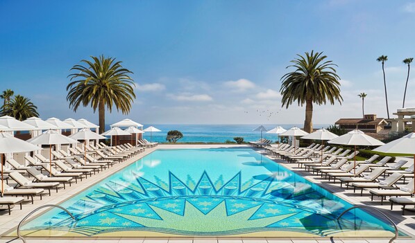 3 outdoor pools, cabanas (surcharge), pool umbrellas