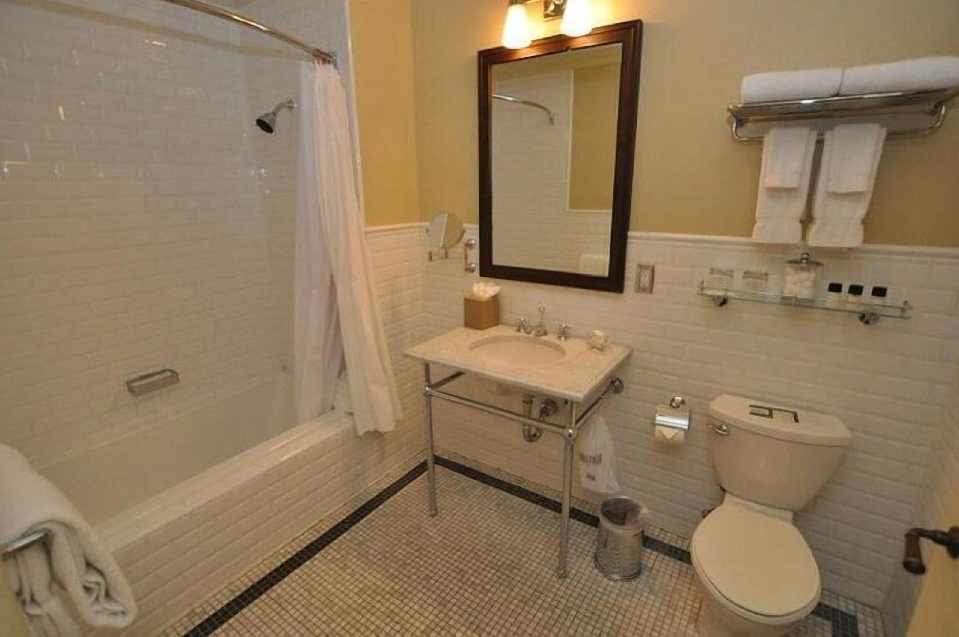 combined shower/bathtub, free toiletries, hair dryer, bathrobes