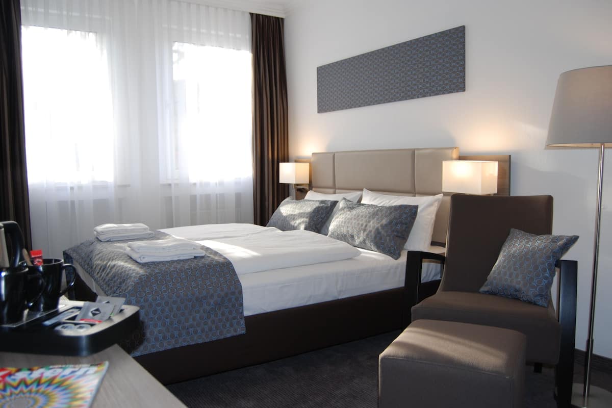 Doppia Deluxe | Biancheria da letto ipoallergenica, una cassaforte in camera