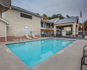 Seasonal outdoor pool, open 10 AM to 10 PM, pool umbrellas