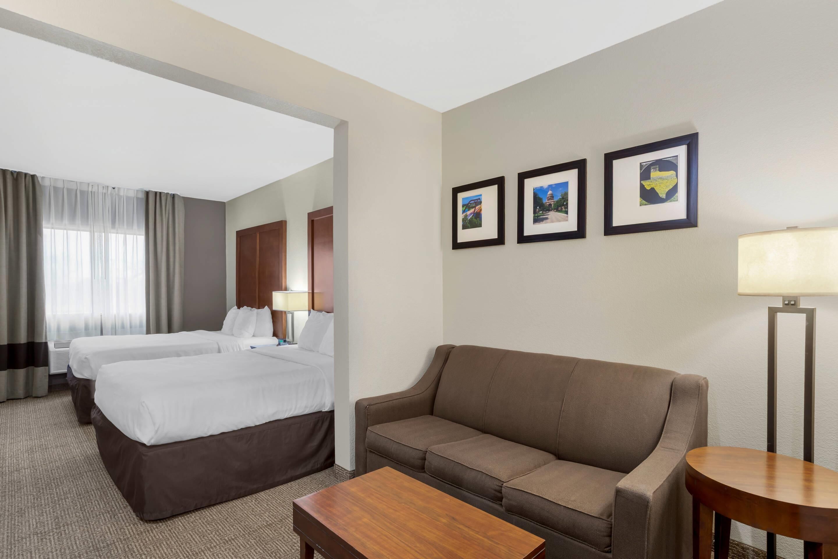 Suite, 2 Queen Beds, Non Smoking | 1 bedroom, desk, iron/ironing board, rollaway beds