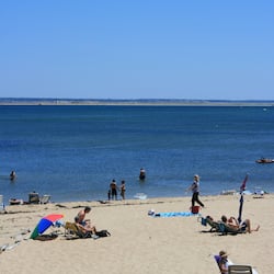 On the beach, sun-loungers