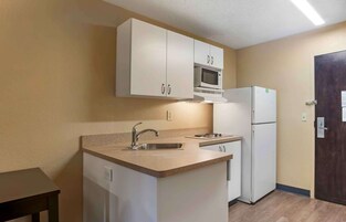 Studio, 1 King Bed, Non Smoking | Private kitchen | Full-size fridge, microwave, stovetop, coffee/tea maker