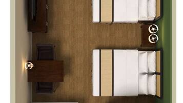 A hotel room layout with a bed, bedside tables, a desk, a chair, a wardrobe, a bathroom, and a window with curtains.