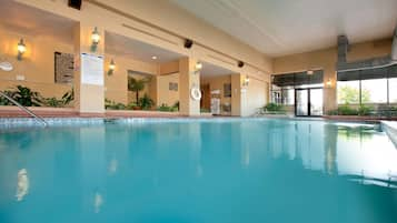 Indoor pool, open 6:00 AM to 10:00 PM, pool loungers