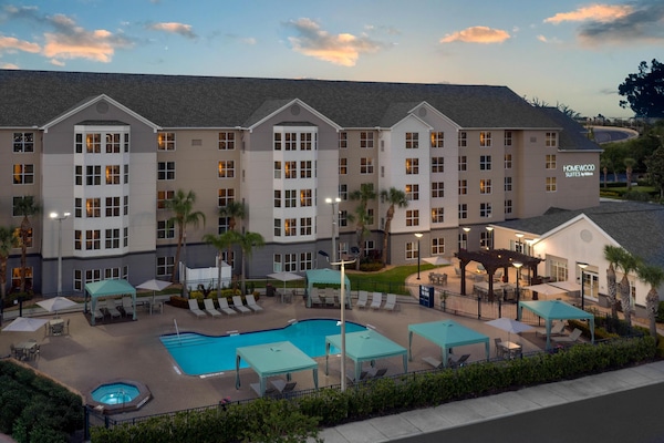 Outdoor pool, open 8:00 AM to 10:00 PM, pool loungers