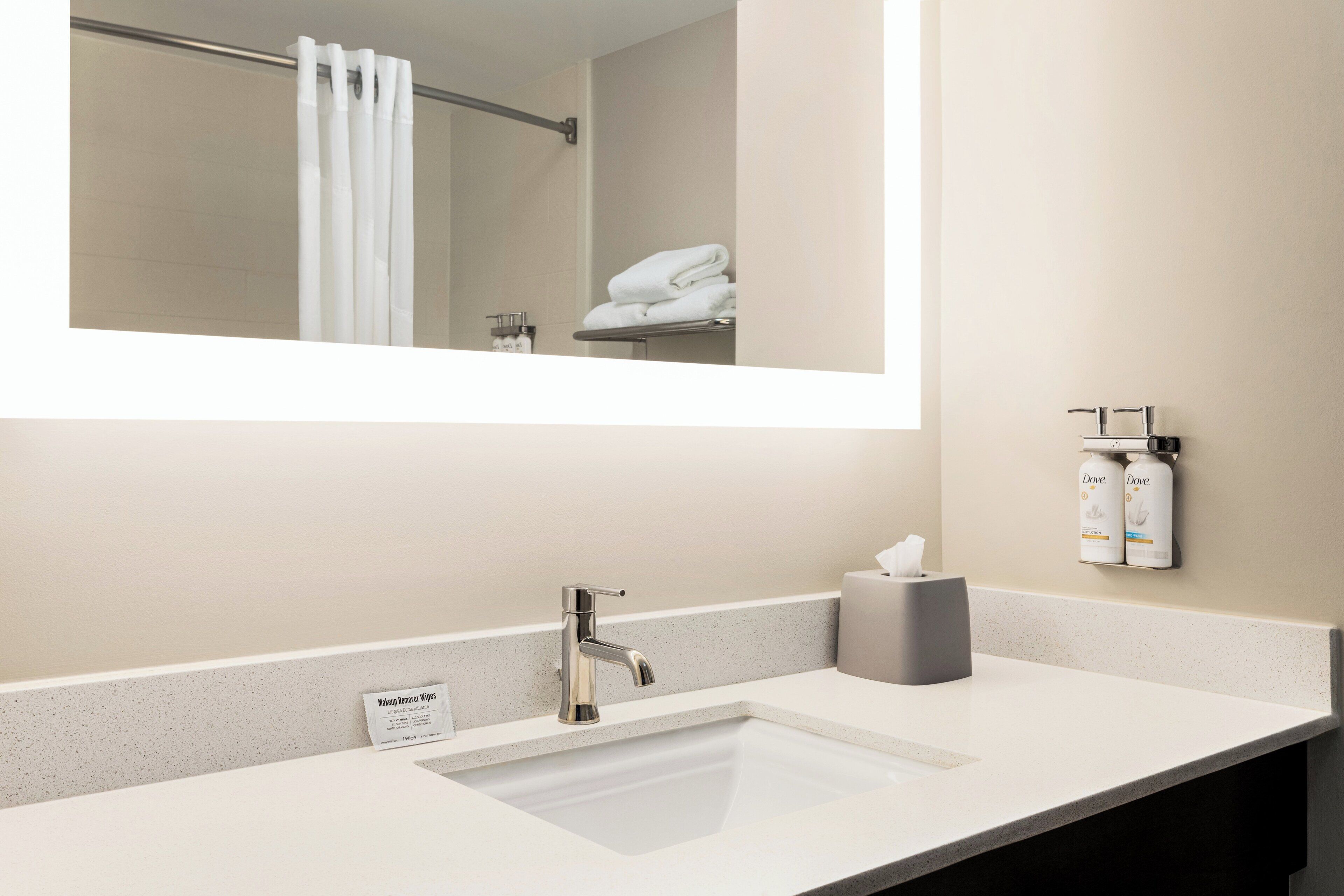 combined shower/bathtub, free toiletries, hair dryer, towels