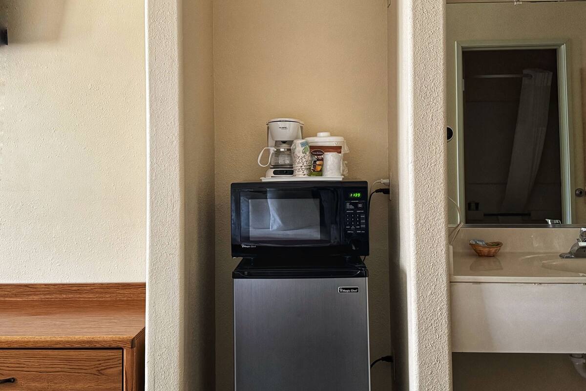 1 bedroom, desk, blackout curtains, iron/ironing board