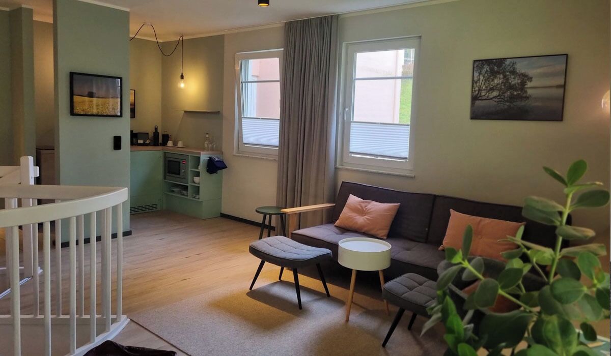 junior duplex | living area | 70-inch tv with satellite channels