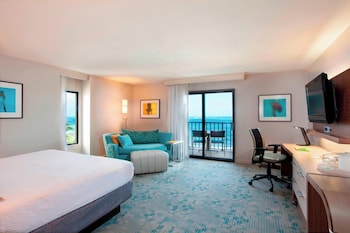 Junior Suite, 1 King Bed with Sofa bed, Non Smoking, Oceanfront | In-room safe, desk, laptop workspace, blackout drapes at Courtyard by Marriott Isla Verde Beach Resort