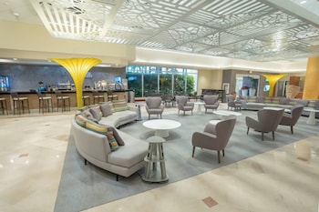 Hotel entrance and lobby at Courtyard by Marriott Isla Verde Beach Resort