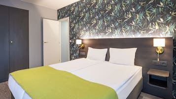 Apartment, 2 Bedrooms (Street-Court View) | In-room safe, desk, laptop workspace, iron/ironing board