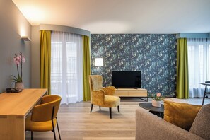 Apartment, 2 Bedrooms (Street-Court View) | Living area | Flat-screen TV