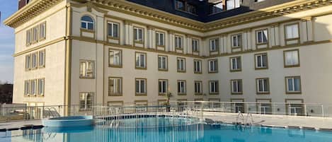 Seasonal outdoor pool, open 8 AM to 8 PM, pool umbrellas, sun loungers