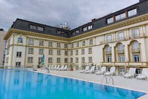 Seasonal outdoor pool, open 8 AM to 8 PM, pool umbrellas, sun loungers