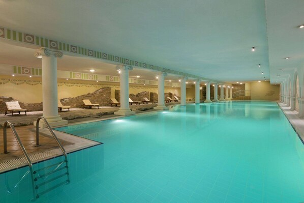 Seasonal outdoor pool, open 8 AM to 8 PM, pool umbrellas, pool loungers
