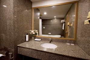 Family Room, Multiple Beds | Bathroom | Combined shower/tub, free toiletries, hair dryer, bathrobes - Prince Palace Hotel Bangkok (Bangkok)