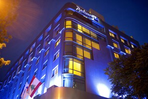 A hotel with a modern design, featuring a prominent 'Radisson' sign at the top. - Radisson BLU Martinez Hotel, Beirut (Beirut)