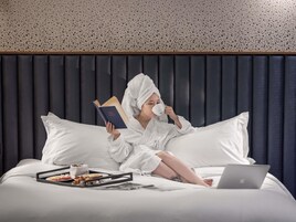 Premium bedding, down comforters, minibar, in-room safe