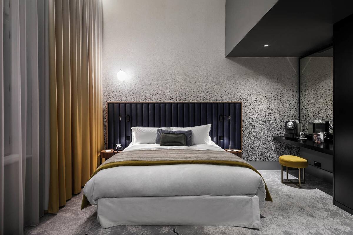 Suite Deluxe, 1 cama King size | Ropa de cama de alta calidad, edredón y minibar