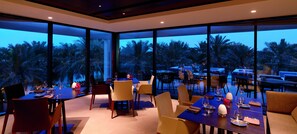 Dinner served, French cuisine, pool views 