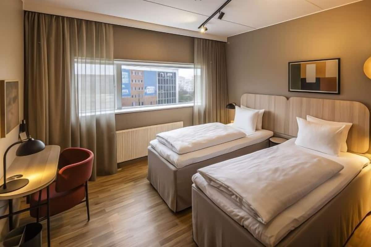 Hypo-allergenic bedding, in-room safe, desk, laptop workspace