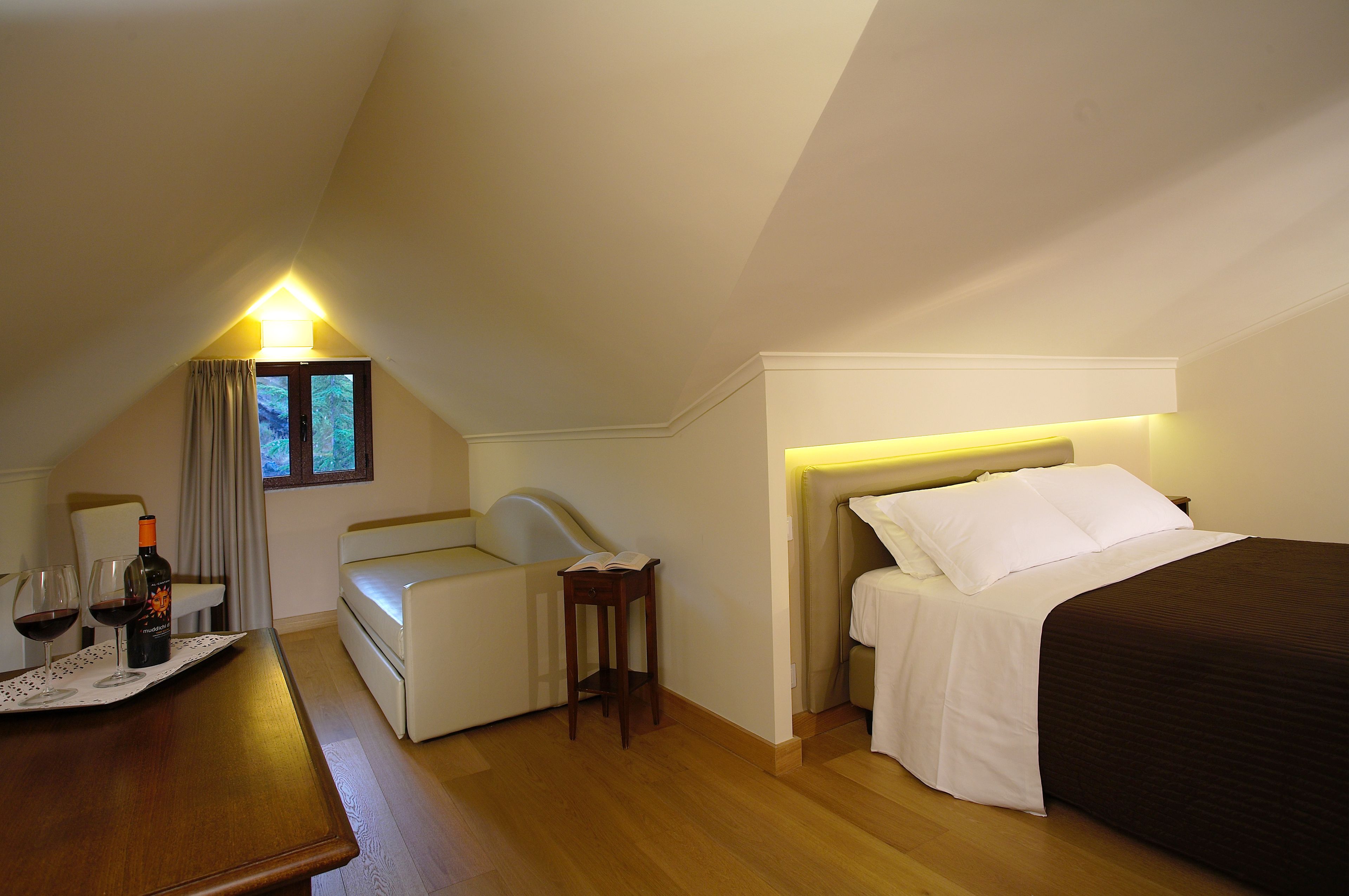 triple room, multiple beds | minibar, in-room safe, desk, blackout curtains