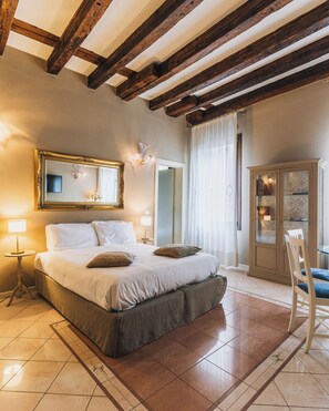 Economy Apartment, 1 Bedroom, Courtyard Area | 1 bedroom, down comforters, individually furnished, desk