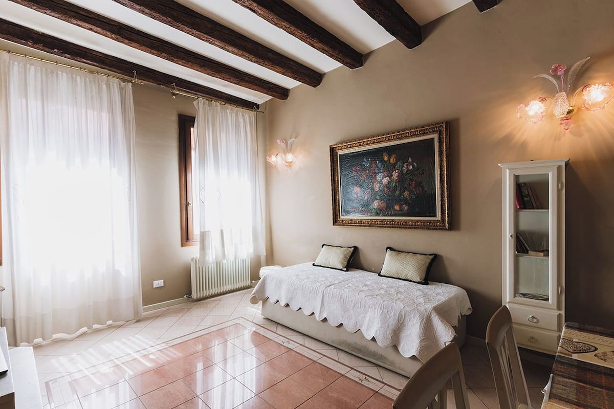 Economy Apartment (Calle) | Living area | 30-inch LED TV with satellite channels