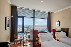 Premium bedding, free minibar, in-room safe, desk