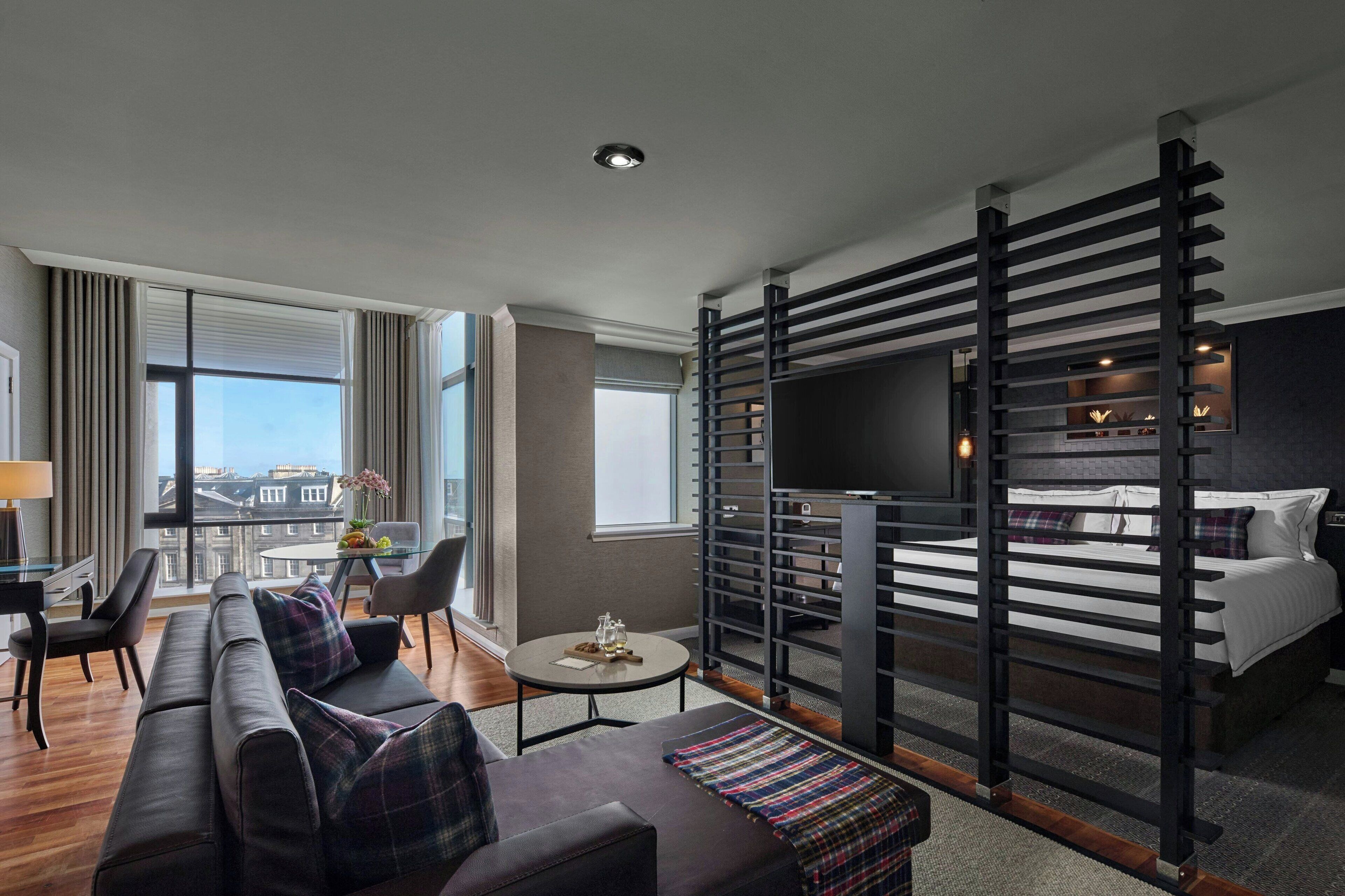 suite, 1 king bed, non smoking, city view | premium bedding, free minibar, in-room safe, desk