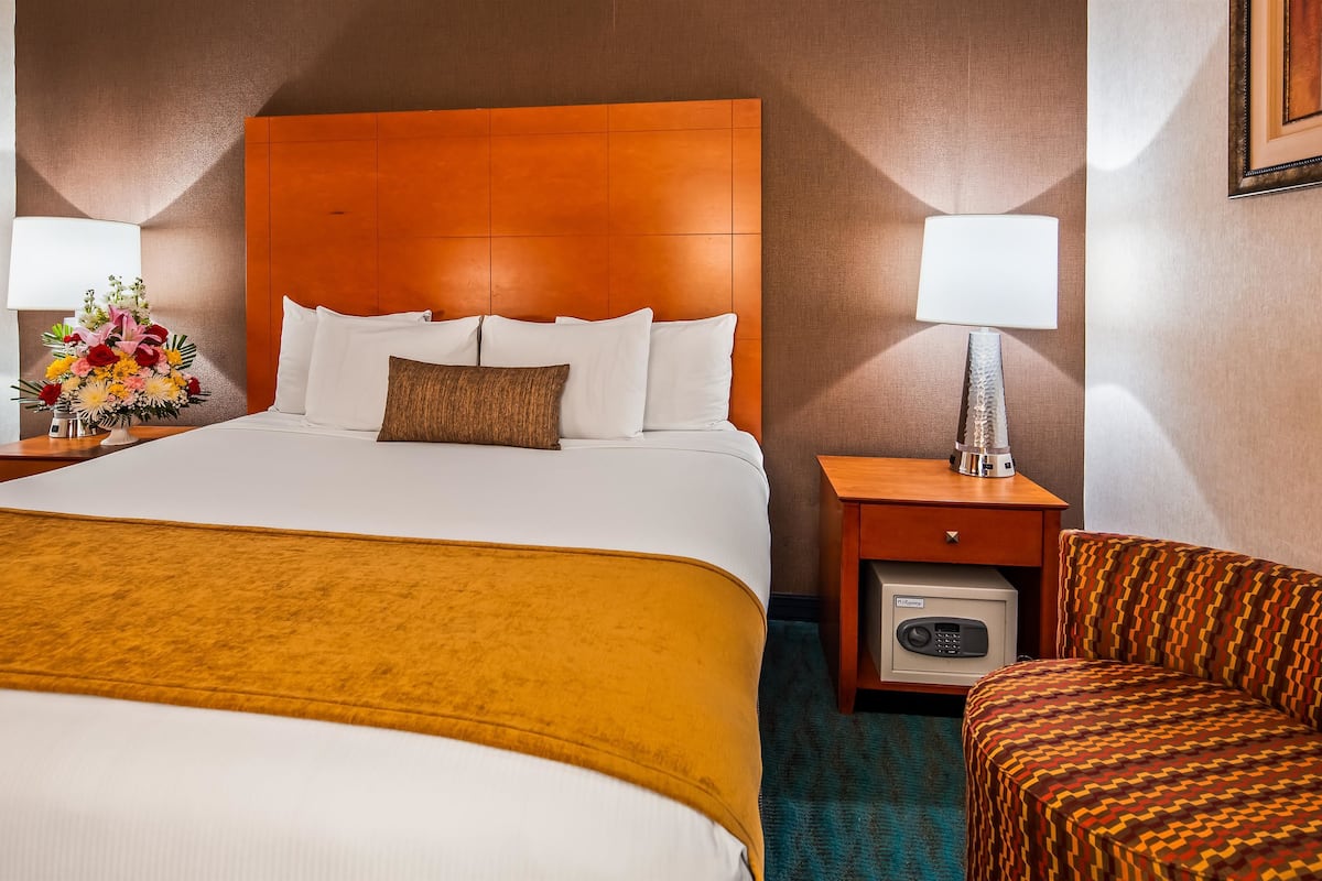 premium bedding, pillow-top beds, desk, laptop workspace