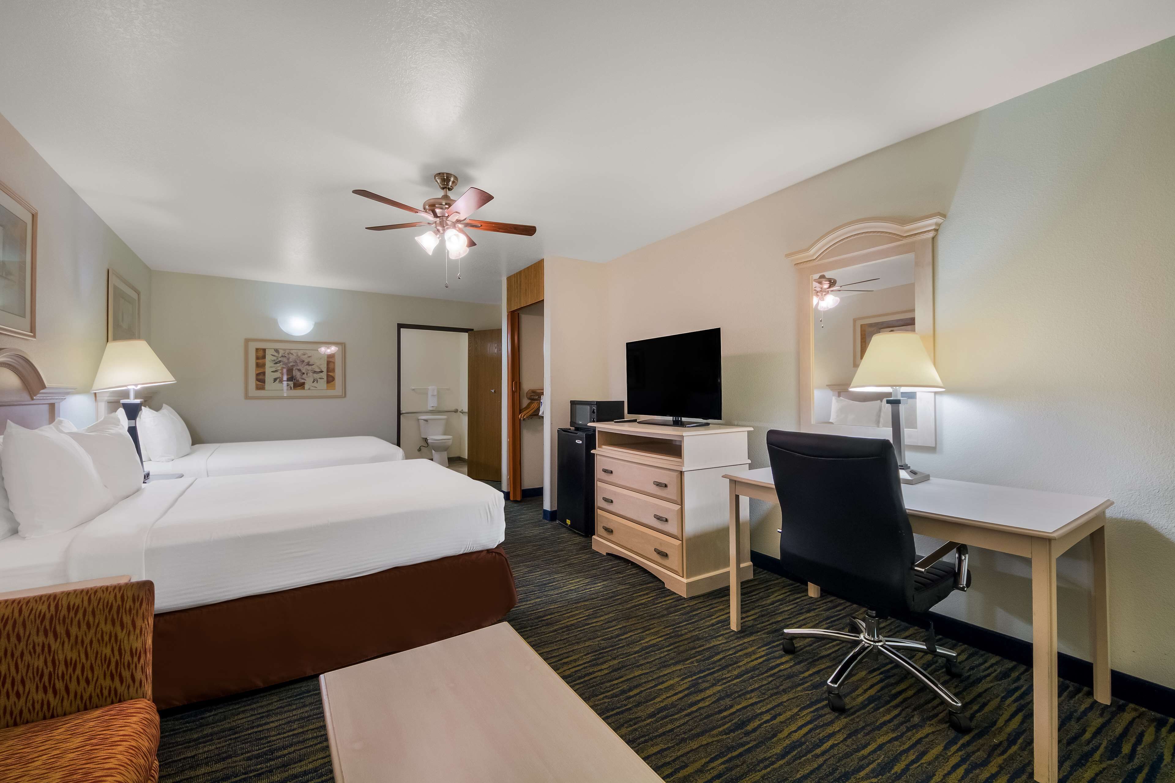 suite, 2 queen beds, accessible, bathtub (larger room) | desk, laptop workspace, iron/ironing board, wifi