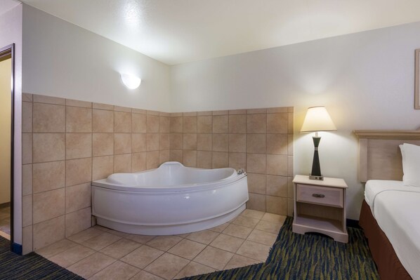 Standard Room, 1 King Bed, Non Smoking, Jetted Tub | 1 bedroom, desk, laptop workspace, iron/ironing board