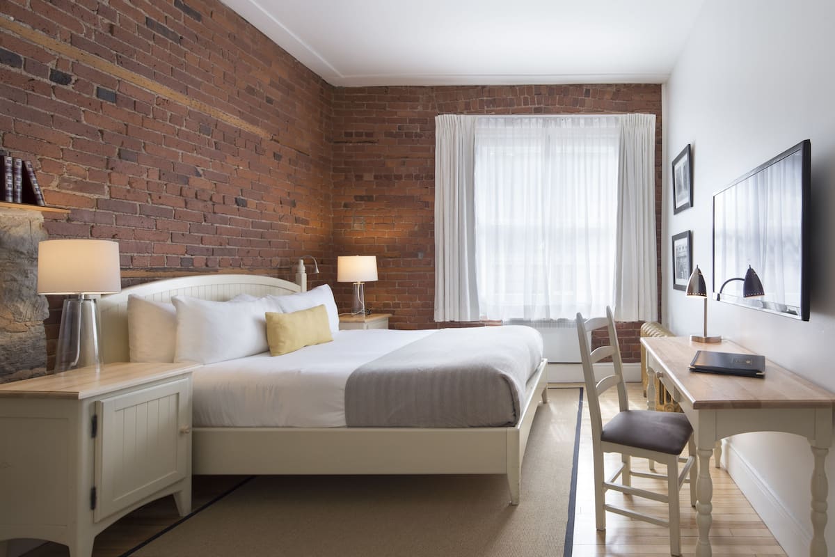 classic room, 1 queen bed | premium bedding, down duvets, pillow-top beds, in-room safe