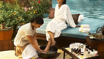 Relax and rejuvenate with a soothing foot soak in our serene spa setting, complete with a pool and self-service amenities.