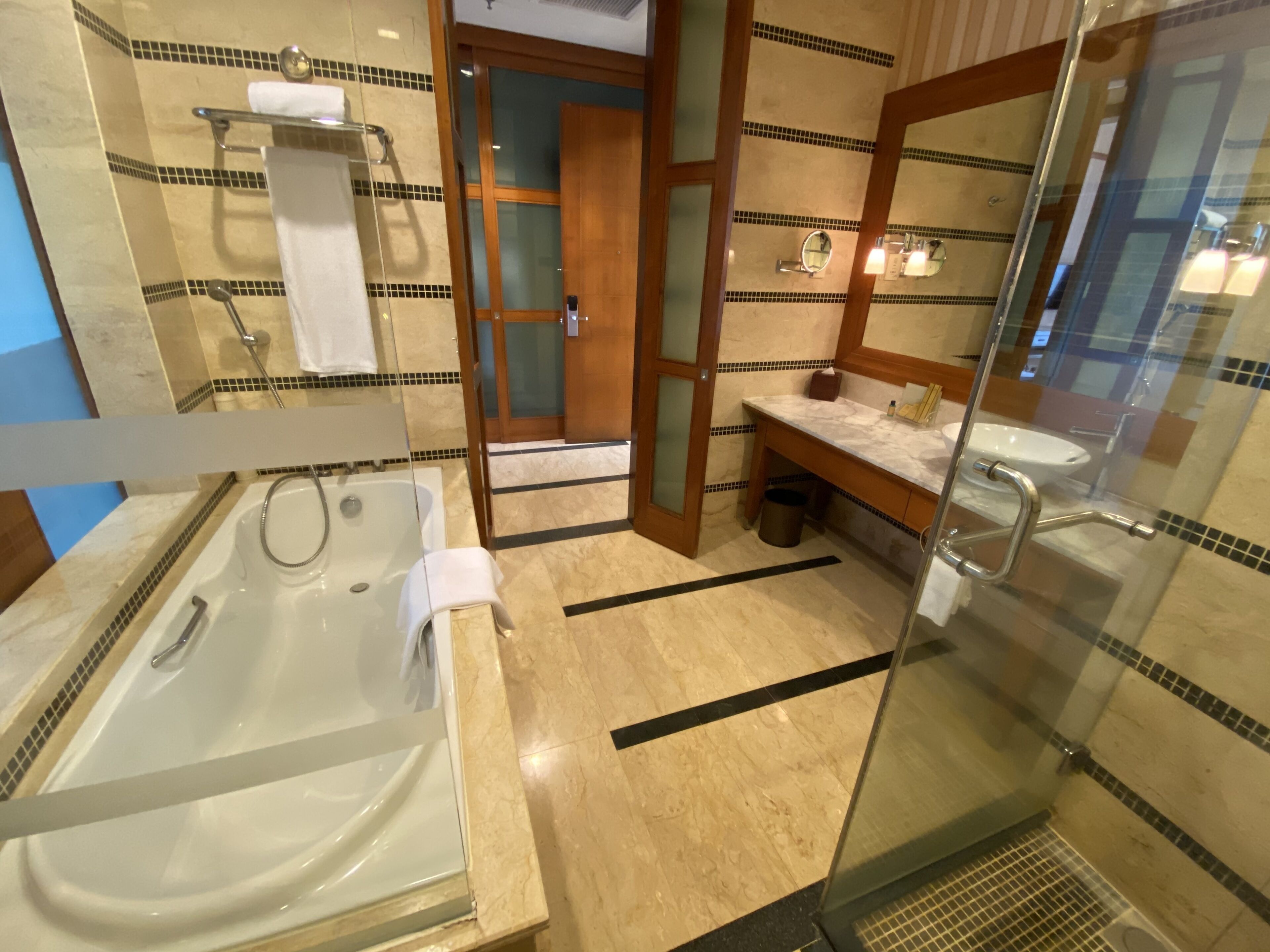 separate bathtub and shower, free toiletries, hair dryer, bathrobes