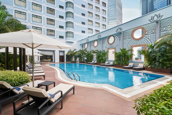 Outdoor pool, open 5:30 AM to 11:00 PM, pool umbrellas