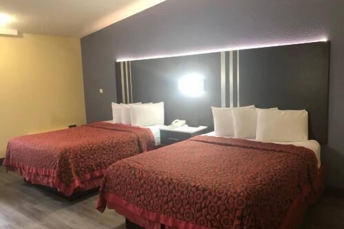 Blackout curtains, iron/ironing board, rollaway beds, free WiFi